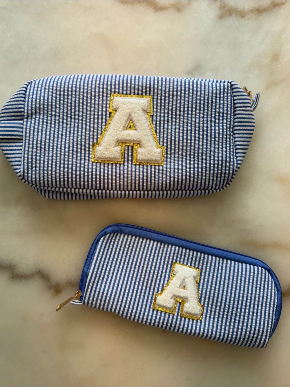 A initial cosmetic pouch set